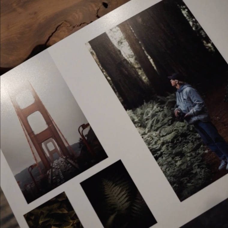 Custom travel photo book gift opened up to show pictures of a person exploring 